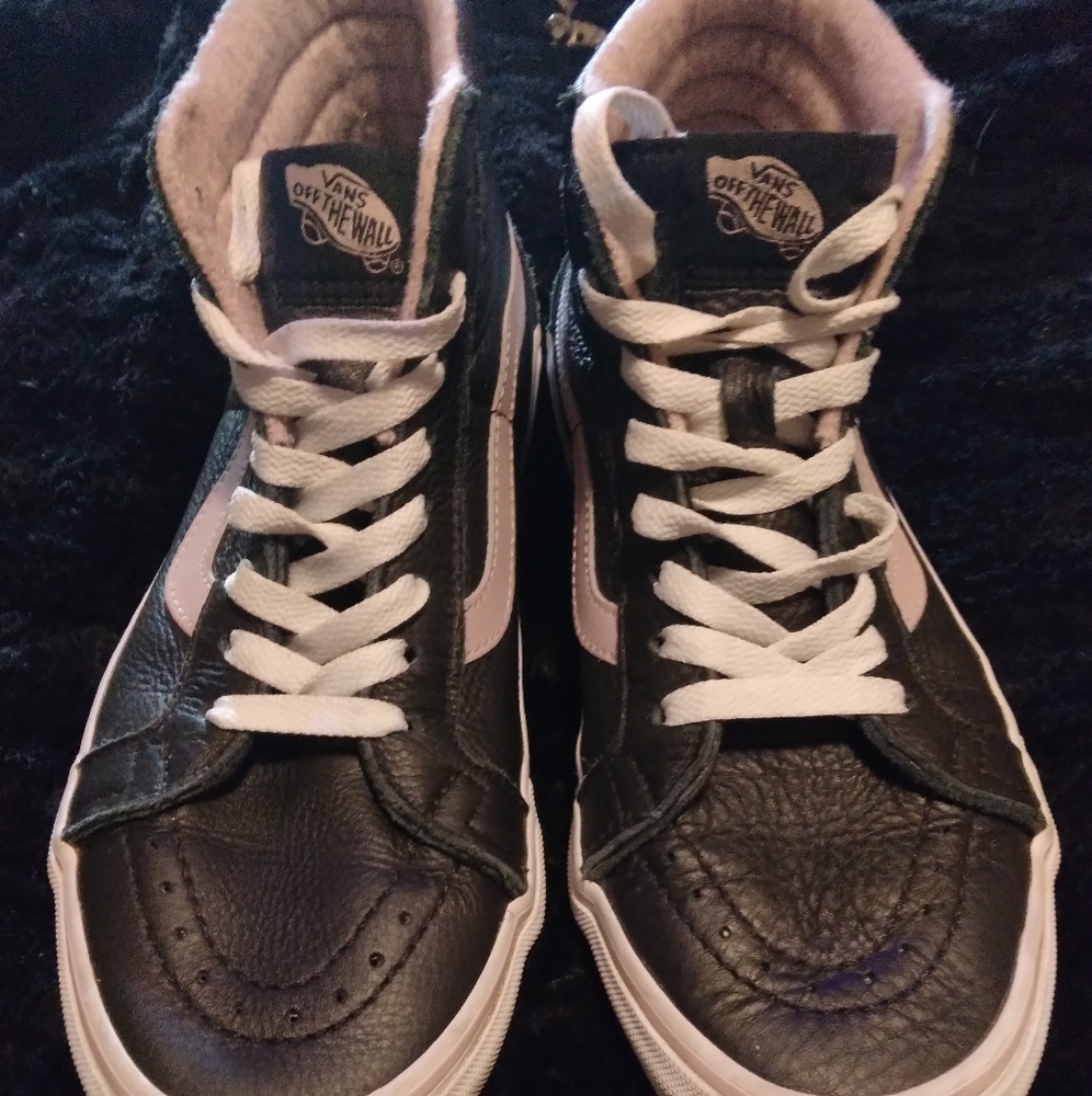 Vans High Tops 7.5 men's 9 women's. Black leather with lavender stripe.